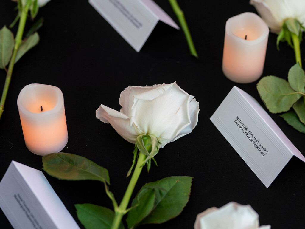 A white rose and white candle