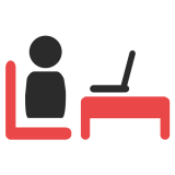 Learning space icon - person sitting at a desk with an open laptop
