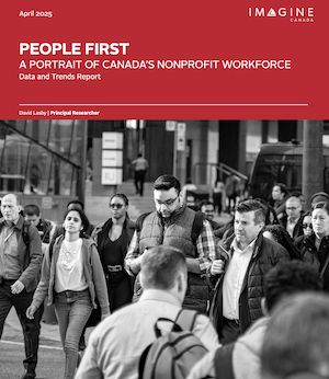 A report cover shows about a dozen Canadians of diverse backgrounds, some looking at their phones, some wearing backpacks, walking down a street.