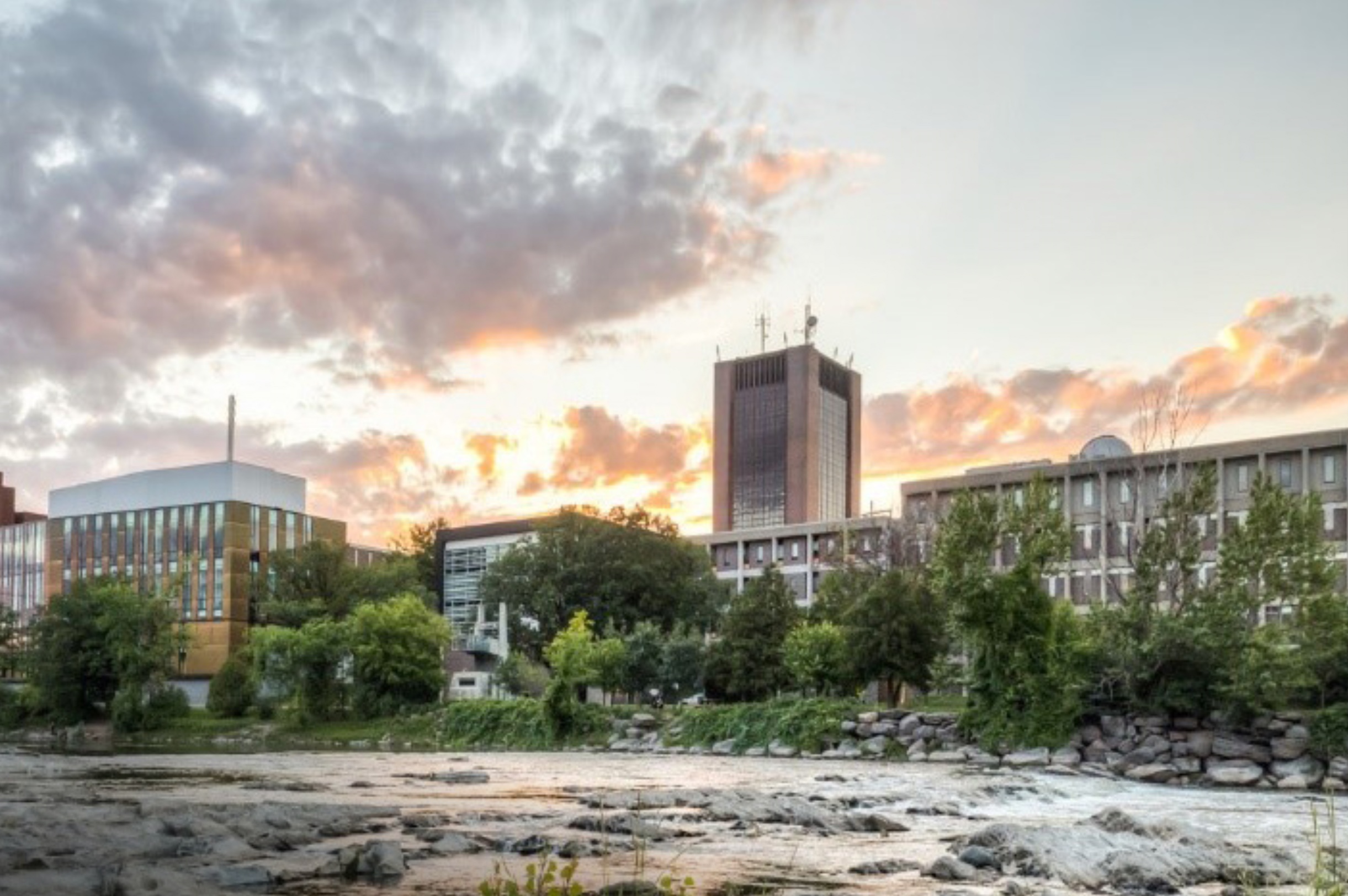 A view of Carleton from the Rideau River during a summer evening.
