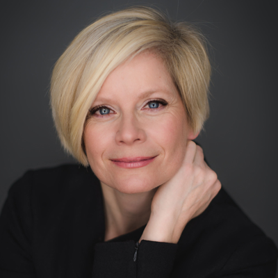 A headshot of Ellen Melis.