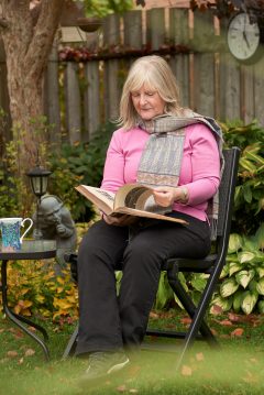 Donor Margaret Haines Sitting In Her Garden
