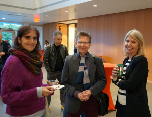 faculty and students enjoy a reception after the talk