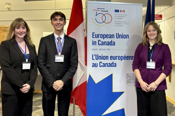 Three Carleton Political Science students pose at the Canadian Model EU