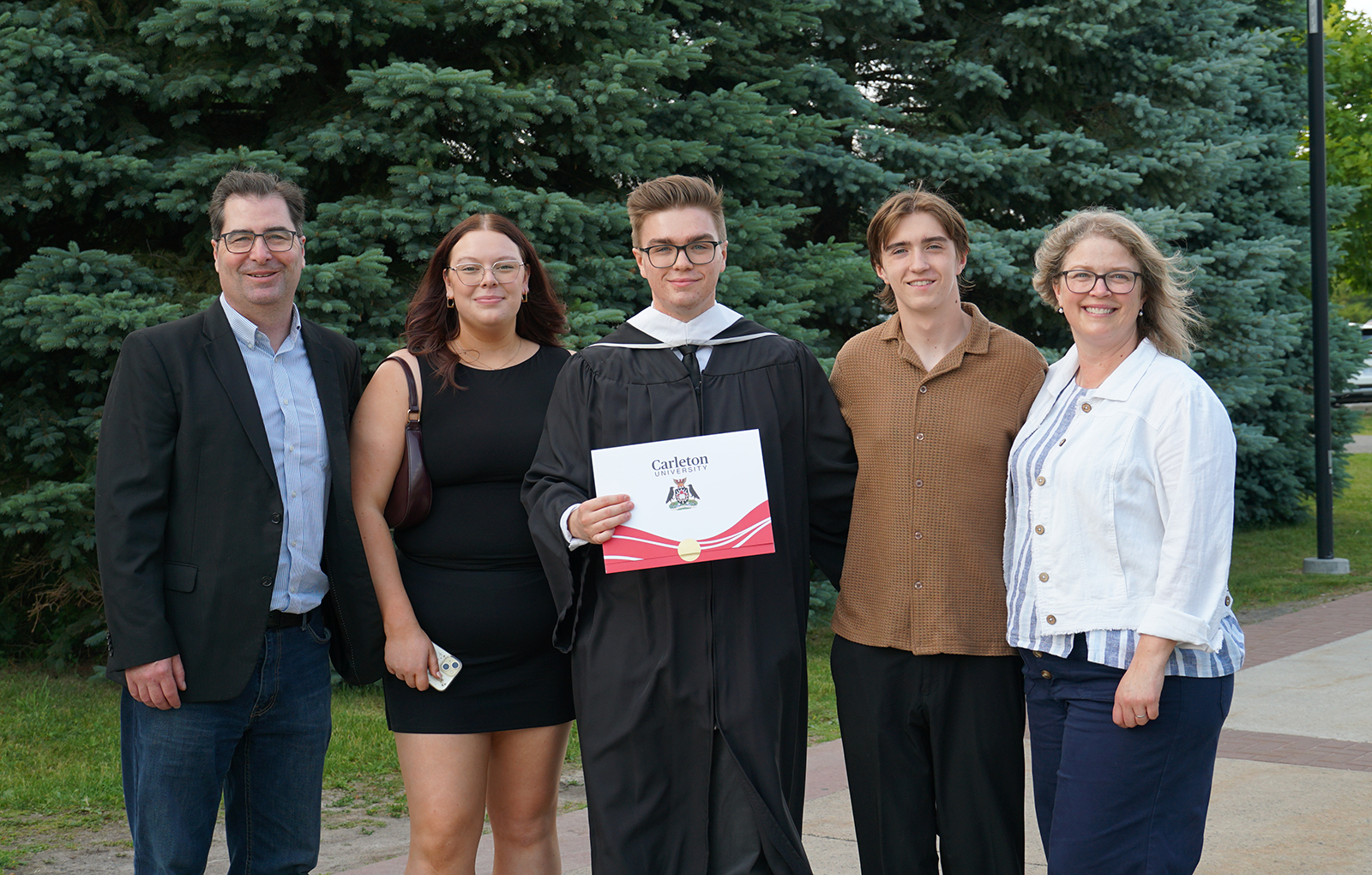 photo of Polisci grad Logan Breen and family