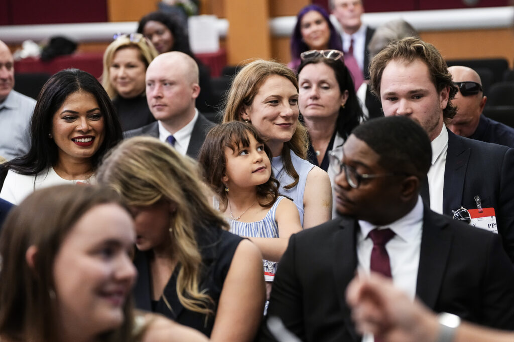 graduates seated in audience at pinning