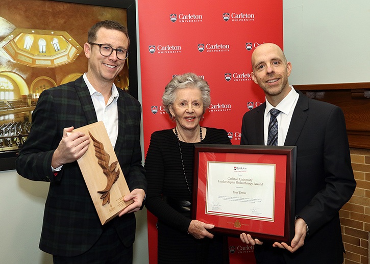 Volunteer award-winners Jay Nordenstrom and Jean Teron with Carleton President Benoit-Antoine Bacon