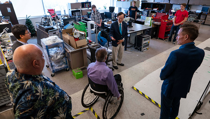 Ontario Minister for Seniors and Accessibility Raymond Cho visits a lab at Carleton