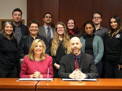 President Benoit-Antoine Bacon with members of the Carleton community