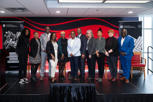 Members of Ottawa U, Carleton U and the Scarborough Charter standing side by side on stage. 