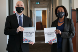 President Benoit-Antoine Bacon and Interim AVP Ikram Jama with the Scarborough Charter