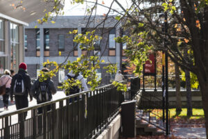 Student walking by Tory building