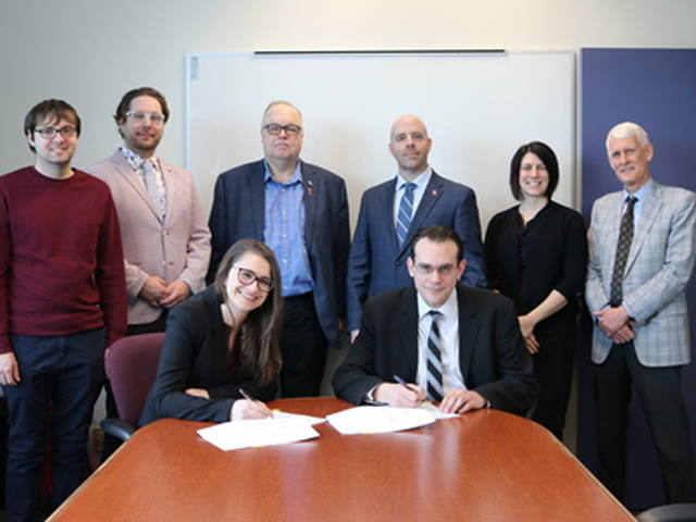 Carleton University’s Board of Governors and PSAC 77000 members sign a tentative collective agreement