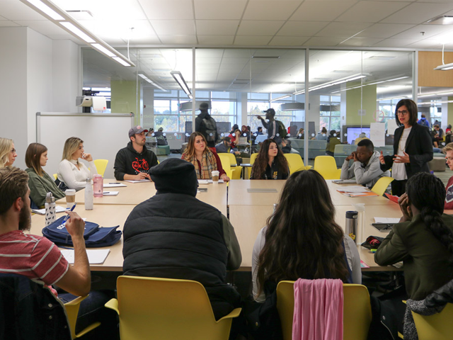 Prof. Melanie Adrian teaches a class in Carleton's Discovery Centre