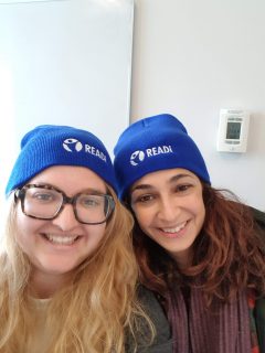 READi Program Coordinator, Barbara, and READi student, Federica pose in their blue beanies with the READi logo