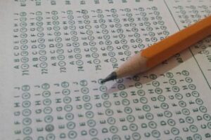 image of a pencil on a multiple choice test papeer