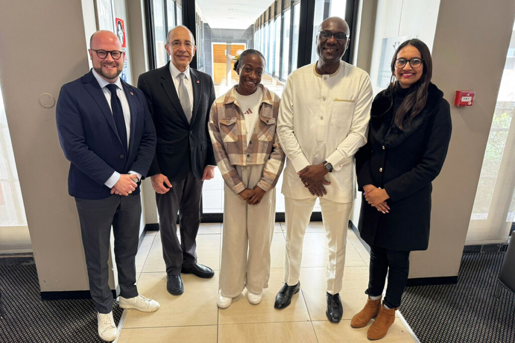 David Hornsby, Rafik Goubran, Wisdom Tettey and 2 media studies scholars at the University of Johannesburg pose for a photo.
