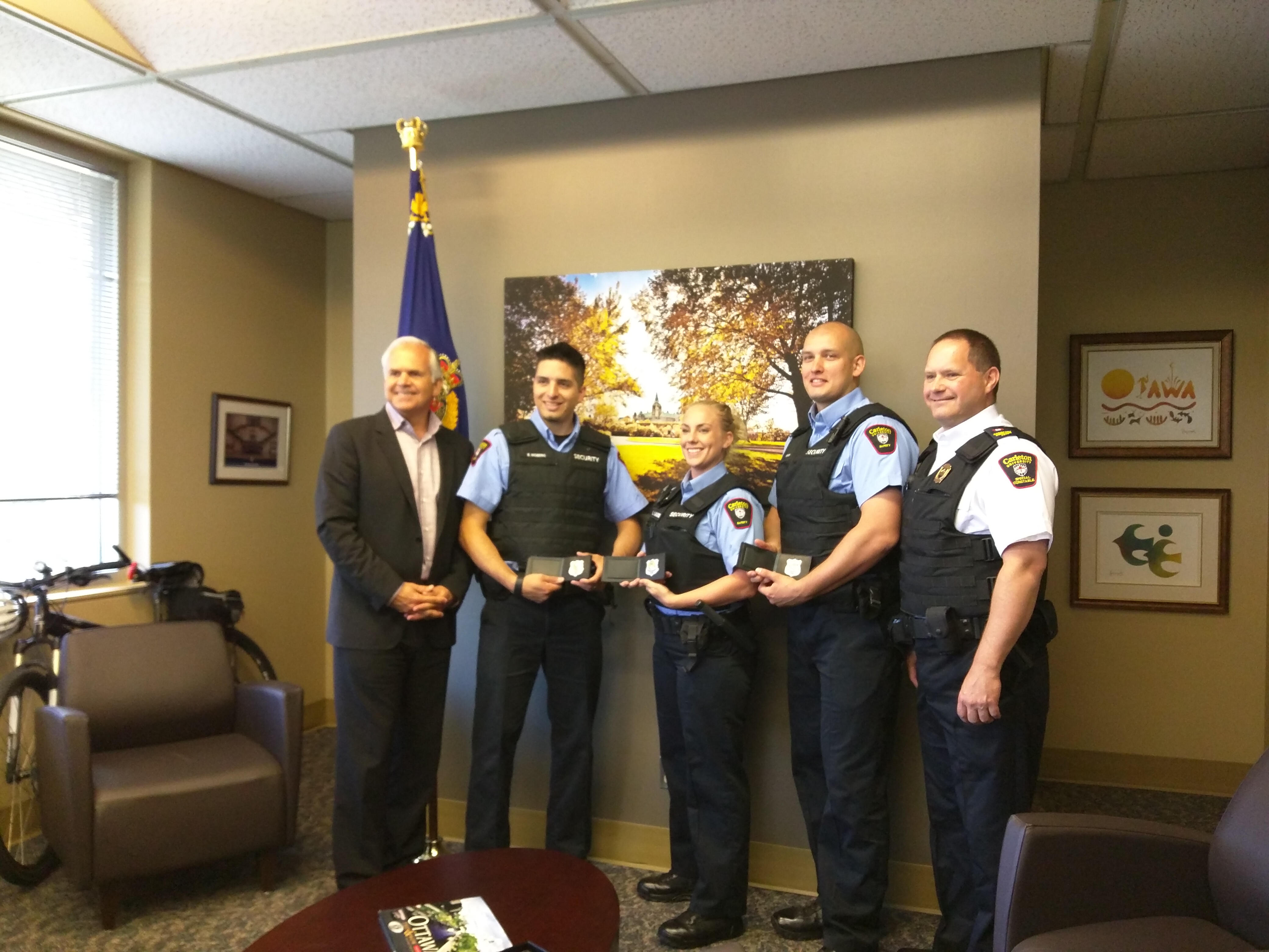 Ottawa Police Chief Charles Bordeleau, S/Cst Benjamin Moberg, S/Cst Laura Lalonde, S/Cst Nicholas Saucier, Acting Assistant Director Christopher Moy