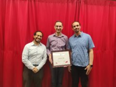 Picture shown Prof. Taha next to him PhD Candidates Mahmoud Yassin and Shazly, where Prof. Taha receives the graduate mentor award for 2025/2026 year in Carleton University