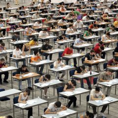 students writing an exam