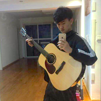 Ruoxin with his guitar