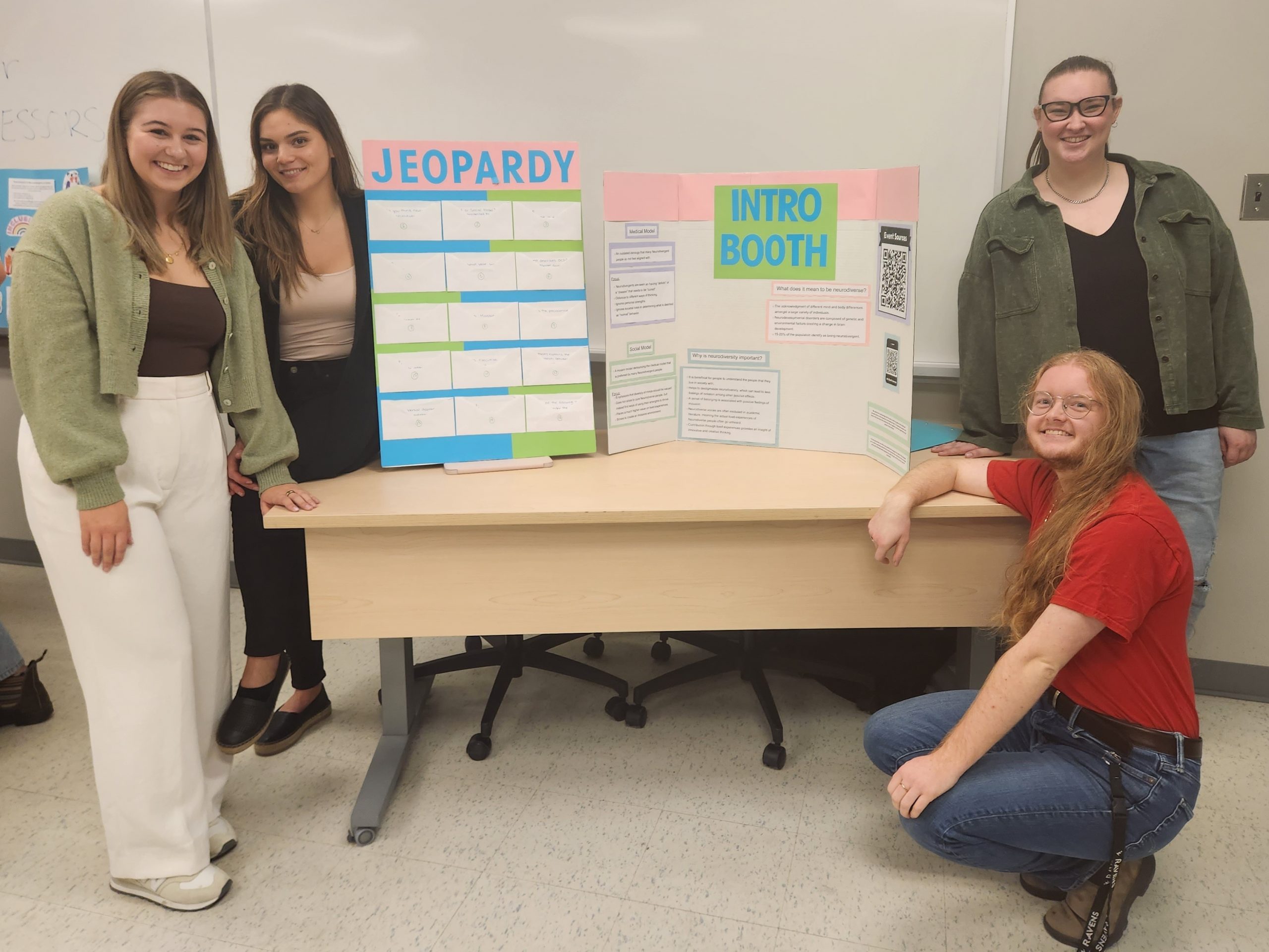 Introduction booth featuring students who hosted a game of Jeopardy