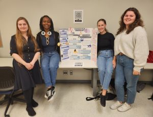 A group of students showing their work on "Neurodiversity and Second Language Acquisition"