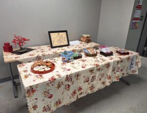 Display table showing Japanese Award certificate.