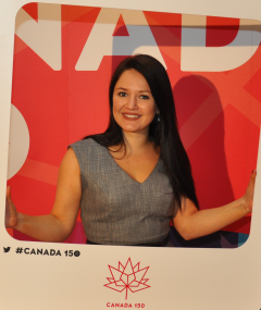 Lauren inside an oversized "Canada 150" picture frame
