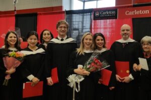 Row of SLaLS MA grads in their robes