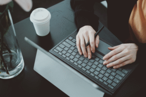 Person typing on a laptop