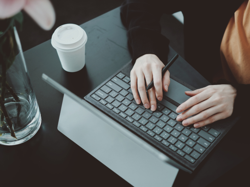 Person typing on a laptop