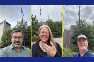 Image of three ASL instructors, Todd, Denise, and David, in front of the World Federation of the Deaf (WFD) flag