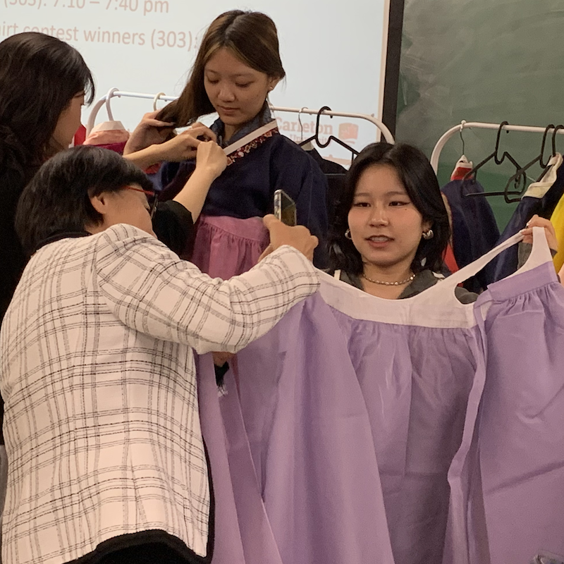 Students looking through hanbok