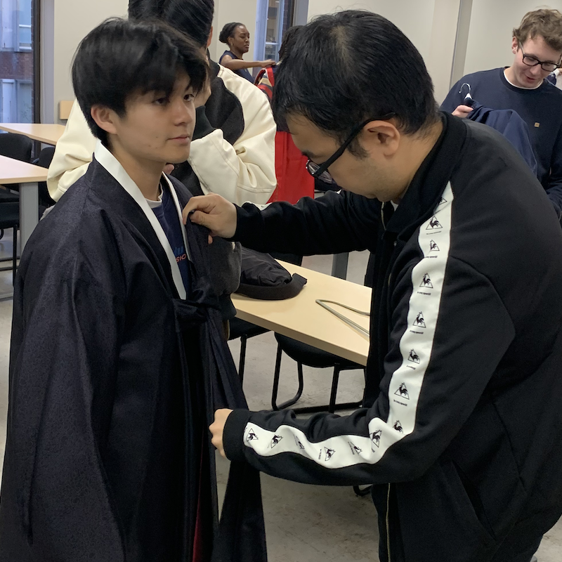 Students looking through hanbok