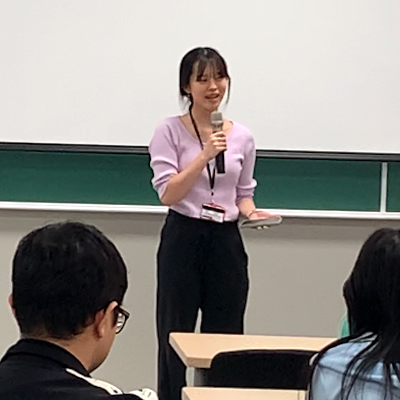 Student reciting poem at Hangeul Day event on October 10