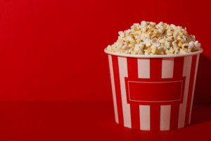 Bag of popcorn with red background
