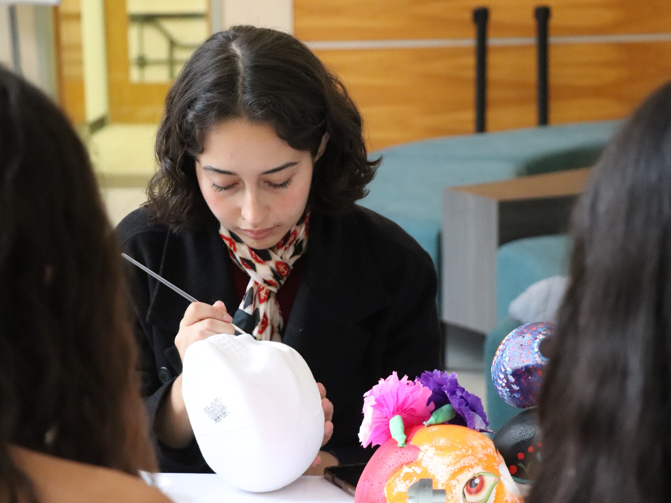 People painting skulls