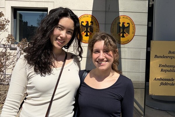 Jordan and Cora pose in front of the German Embassy