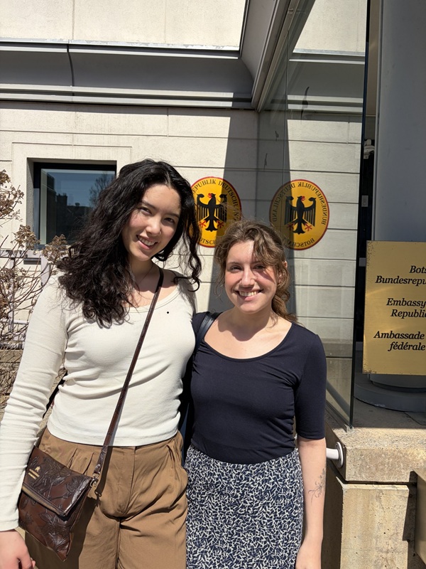 Jordan and Cora pose in front of the German Embassy