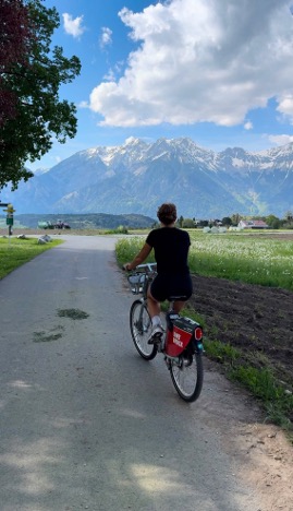Mia biking in the Alps.
