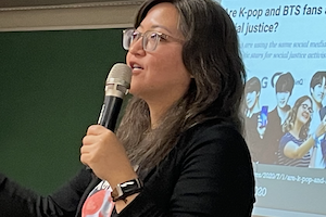 Michelle Cho speaking into a microcu_people_phone