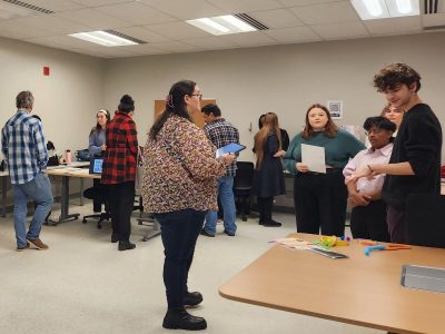 Students presenting their research in a classroom