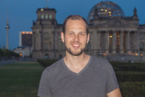 Adam standing in front of Bundestag