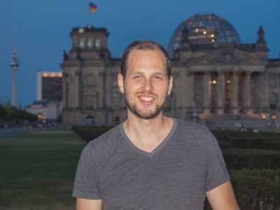 Adam standing in front of Bundestag