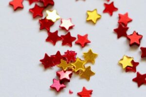red and gold stars on a white background