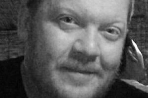 Chris Smith headshot in black and white