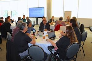 Group seated around a circular table
