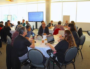 Group seated around a circular table