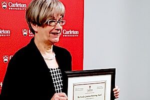 Janna holding certificate